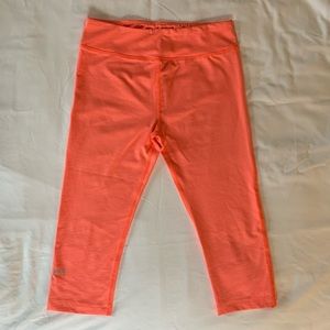 Under armored cropped leggings.